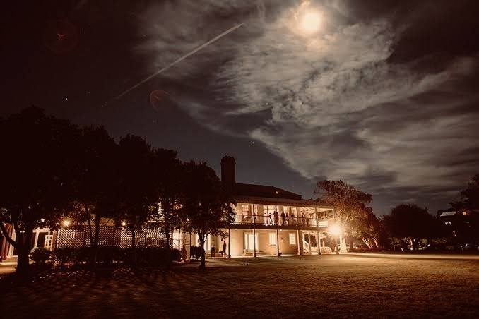 Alhambra Hall at night under a full moon